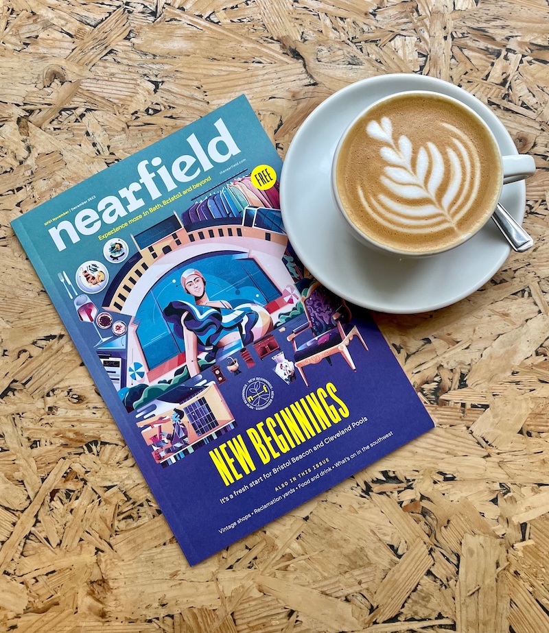 Nearfield magazine and coffee on a wooden table